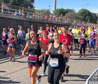 Photo of two women taking part in Great North Run to raise money for Second Chance